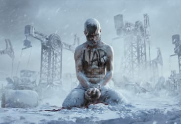 A man frozen in the snow on his knees, hunched forward, with the word "liar" painted on his chest.